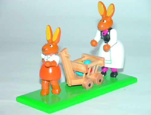 Hasenmutter mit Kind und Handwagen